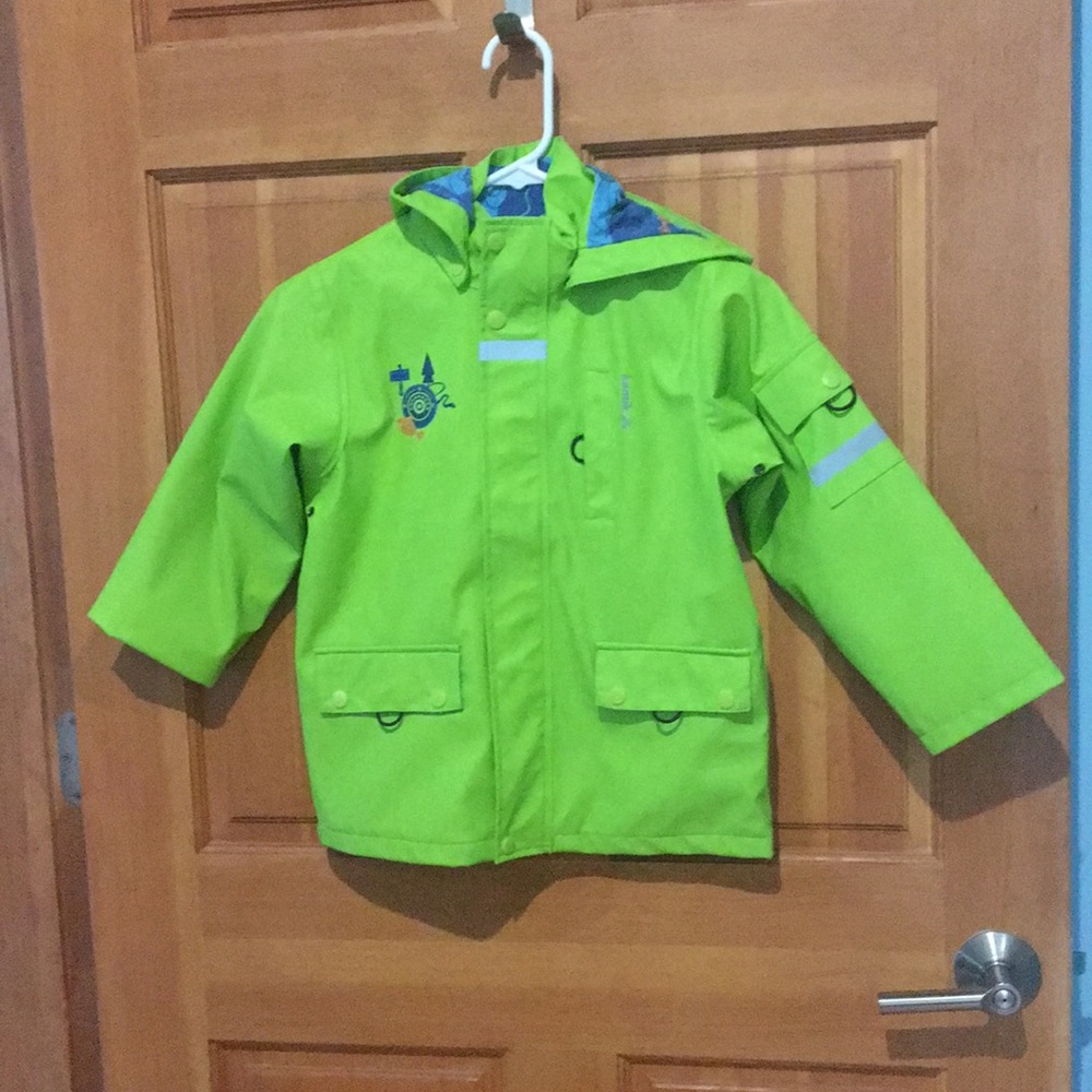 Kamik brand kids lime green rain jacket.